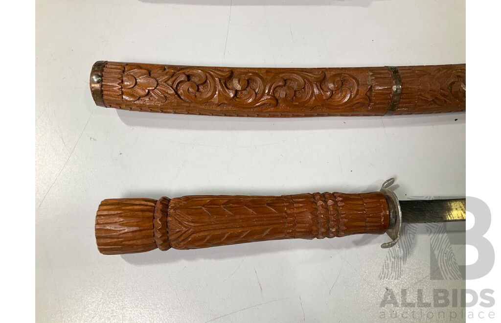 Three Vintage South East Asian Swords with Timber Scabbards