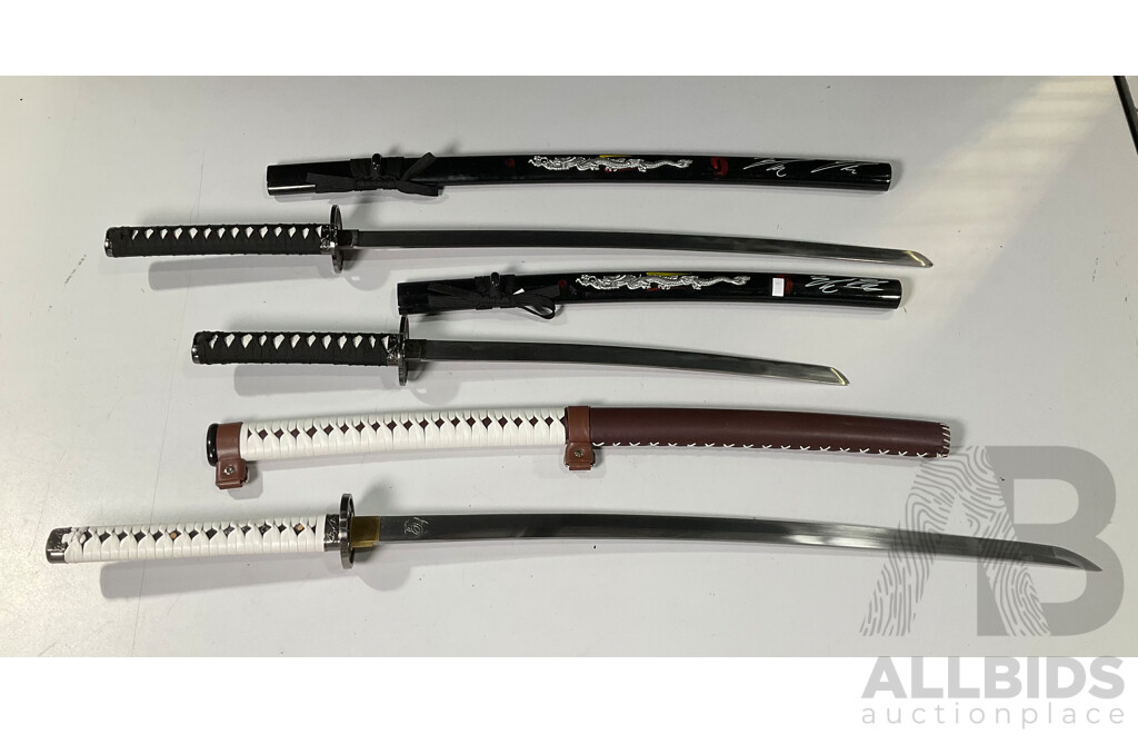 Three Samurai Display Swords with Scabbards