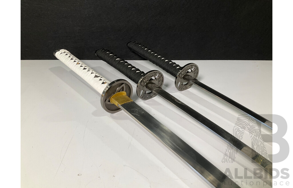 Three Samurai Display Swords with Scabbards
