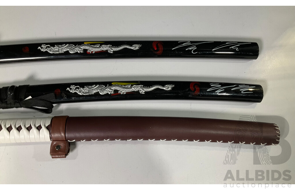 Three Samurai Display Swords with Scabbards