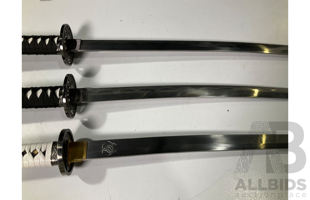 Three Samurai Display Swords with Scabbards