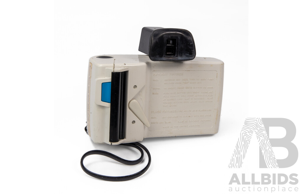 Two Vintage Polaroid Cameras with Carry Cases and User Manuals