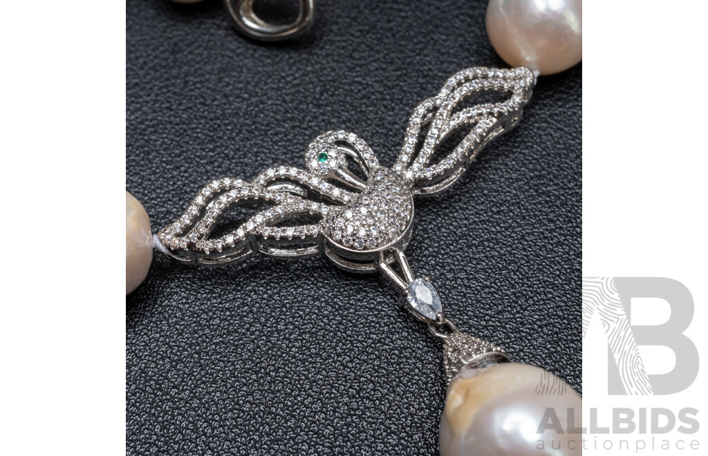 Baroque Freshwater Pearl Necklace with Silver Tone & Cubic Zirconia Swan Pendant. Length - 55cms