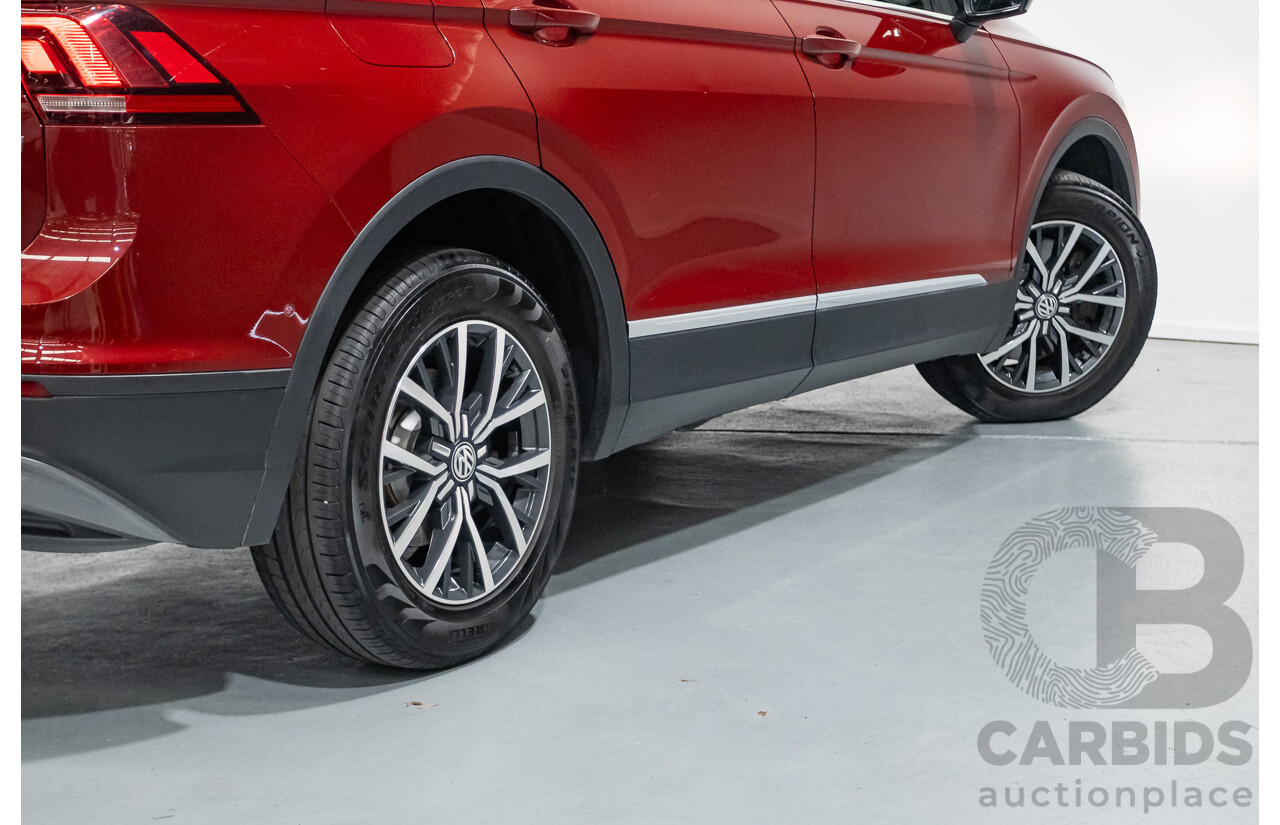 11/2016 Volkswagen Tiguan 132 TSI Comfortline (AWD) 5NA 4d Wagon Ruby Red Metallic Turbo 2.0L
