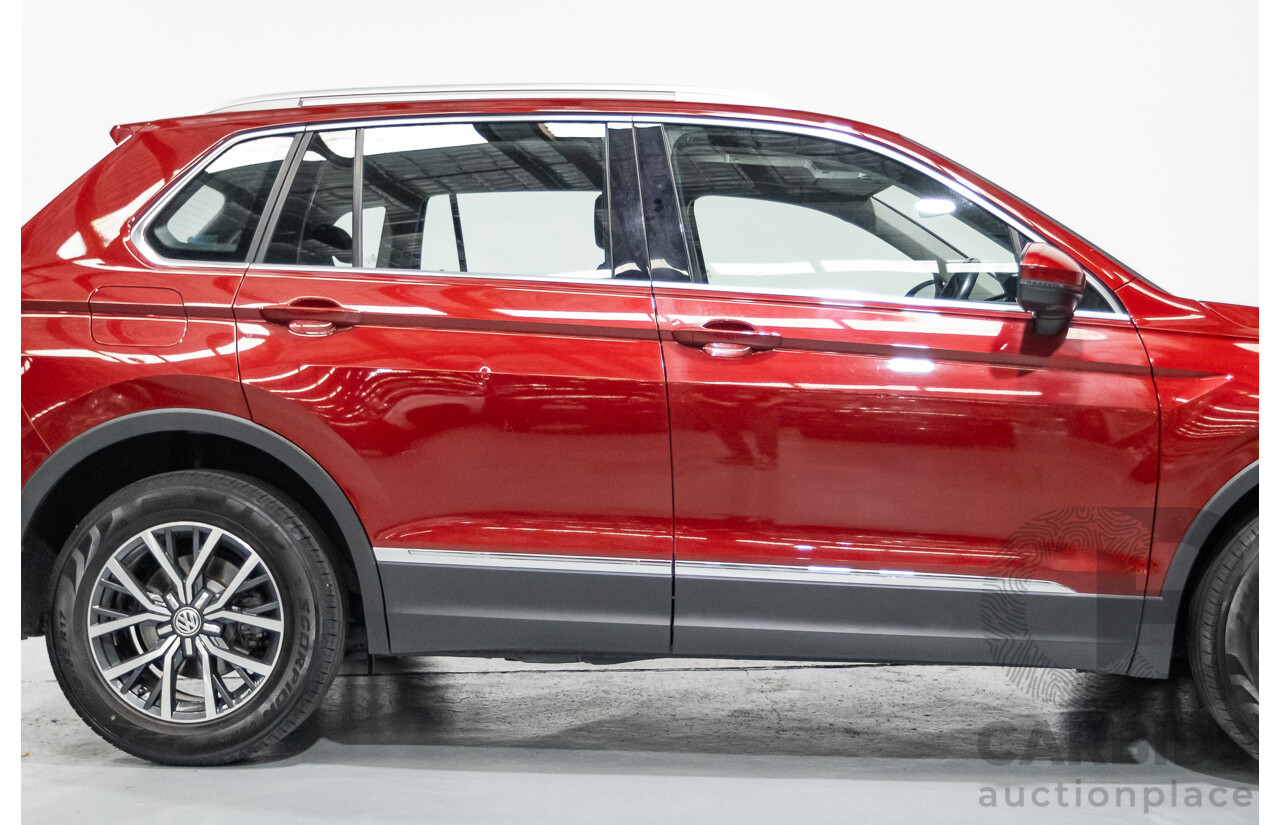 11/2016 Volkswagen Tiguan 132 TSI Comfortline (AWD) 5NA 4d Wagon Ruby Red Metallic Turbo 2.0L