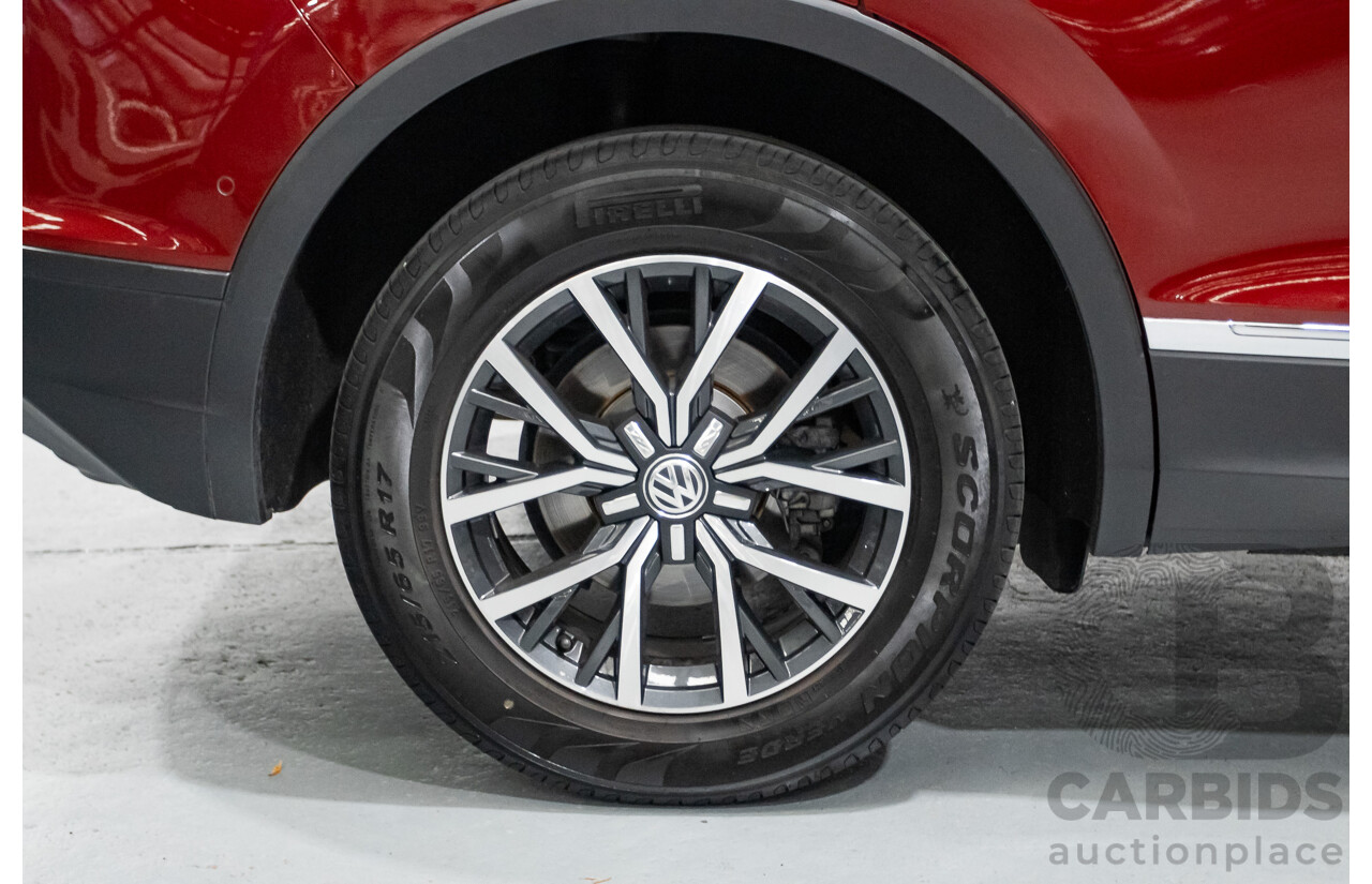 11/2016 Volkswagen Tiguan 132 TSI Comfortline (AWD) 5NA 4d Wagon Ruby Red Metallic Turbo 2.0L