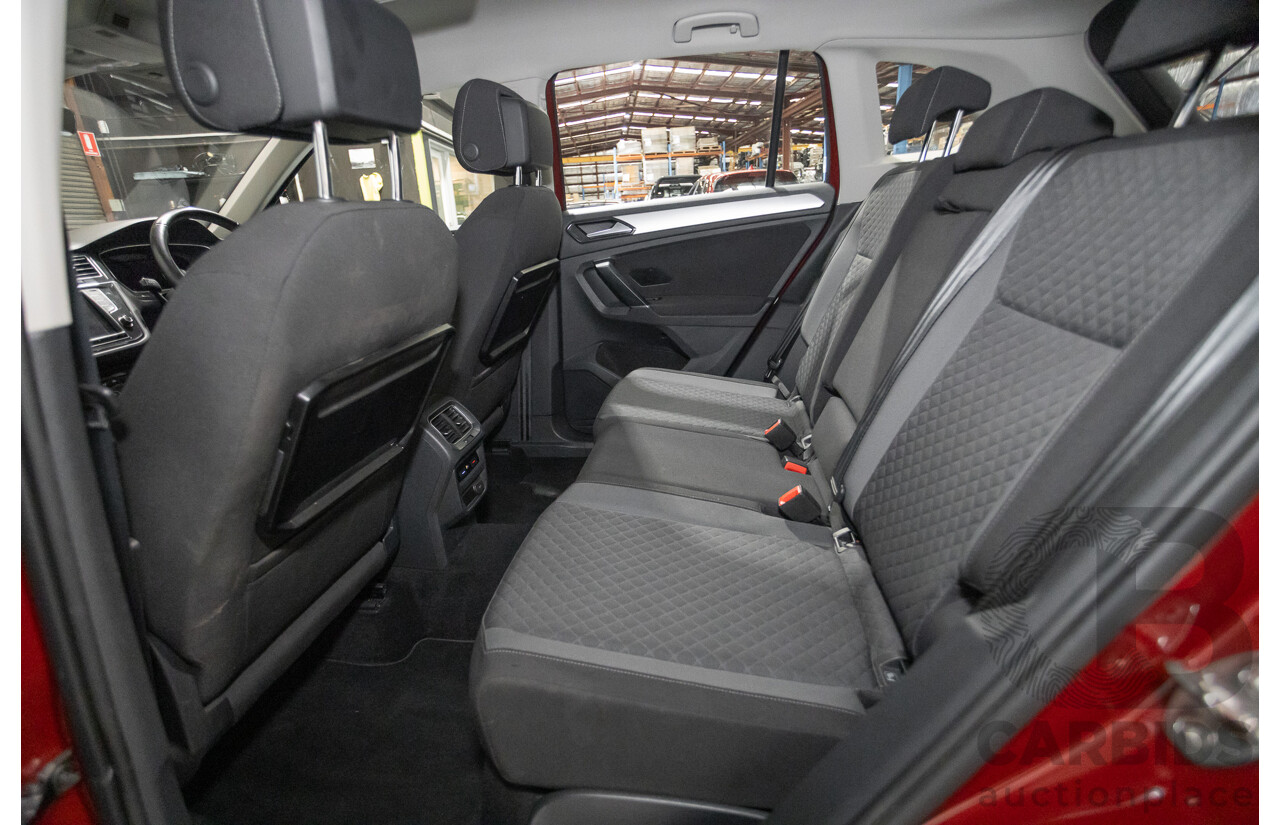 11/2016 Volkswagen Tiguan 132 TSI Comfortline (AWD) 5NA 4d Wagon Ruby Red Metallic Turbo 2.0L