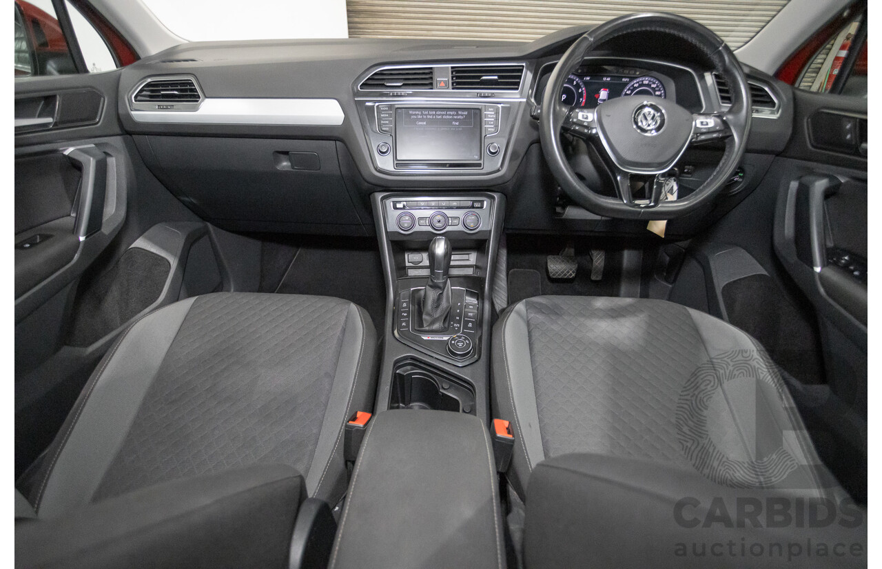 11/2016 Volkswagen Tiguan 132 TSI Comfortline (AWD) 5NA 4d Wagon Ruby Red Metallic Turbo 2.0L