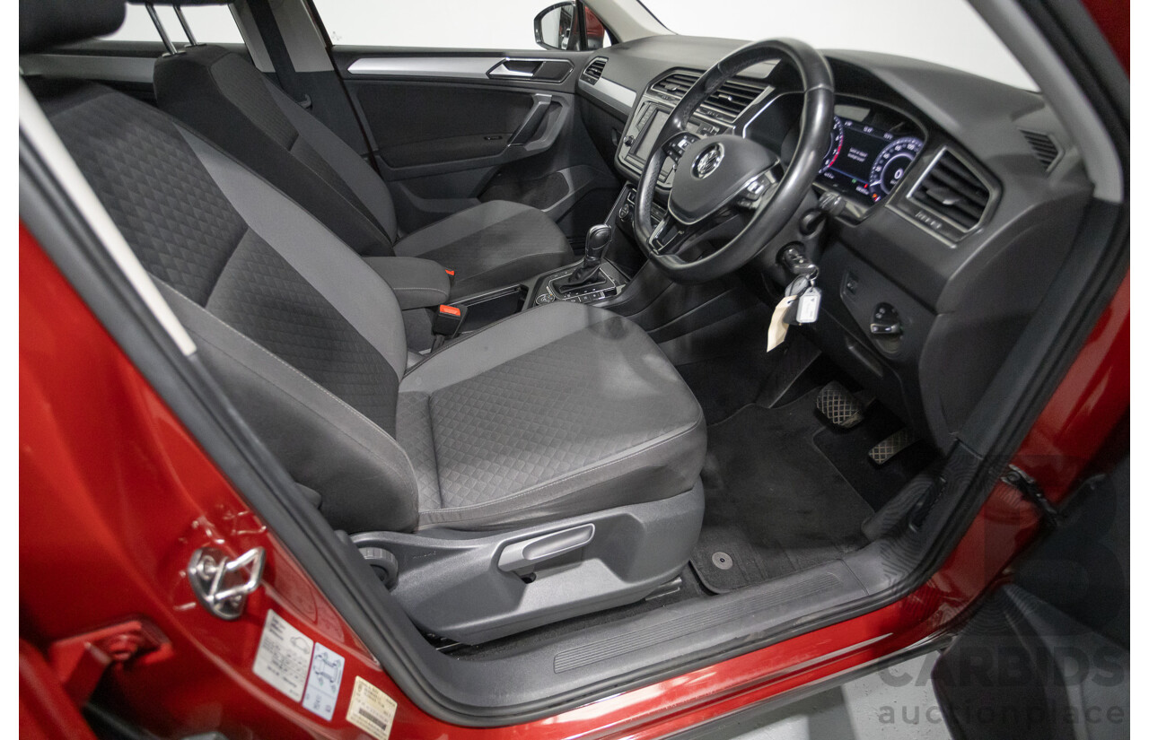 11/2016 Volkswagen Tiguan 132 TSI Comfortline (AWD) 5NA 4d Wagon Ruby Red Metallic Turbo 2.0L