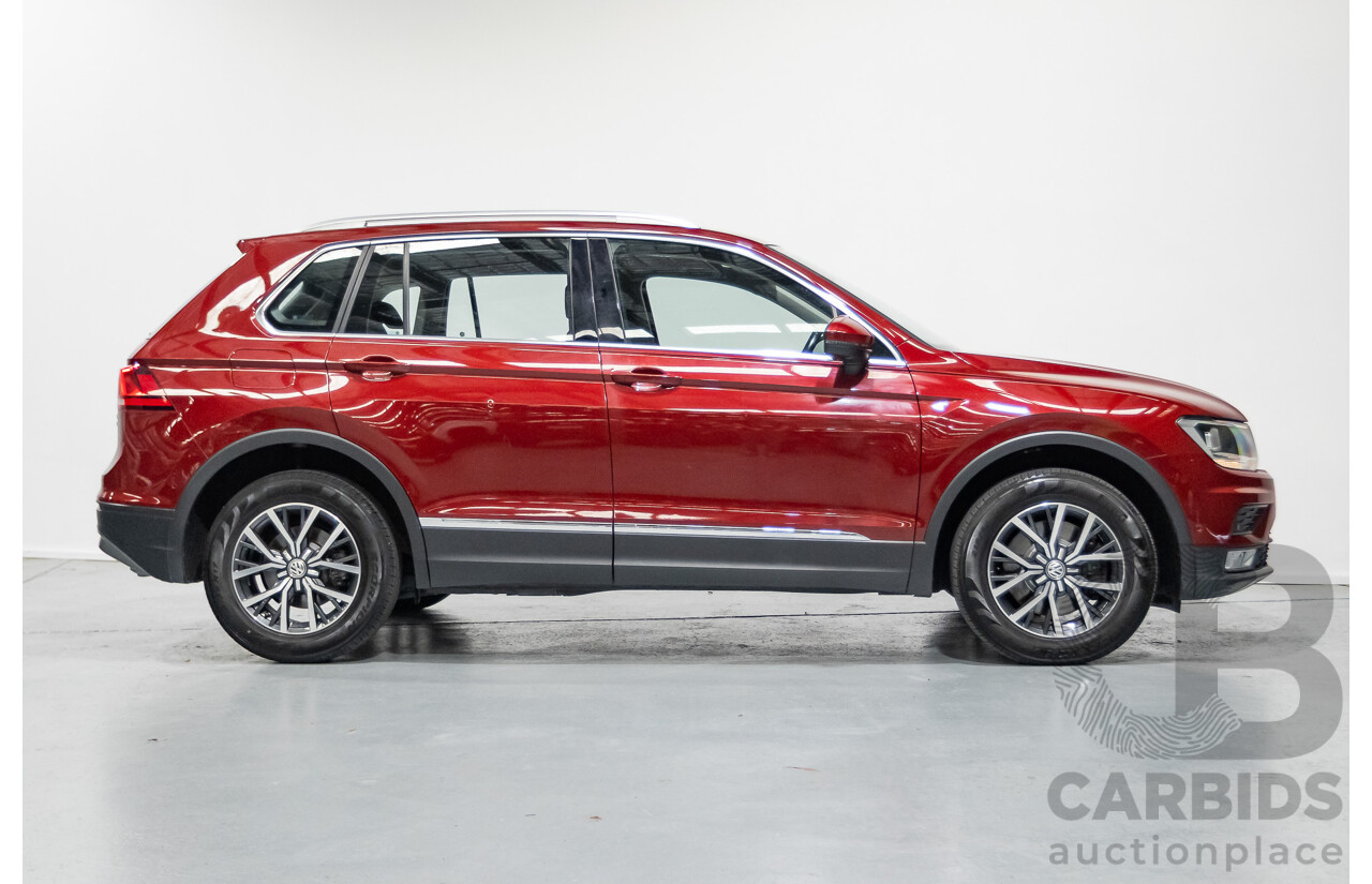 11/2016 Volkswagen Tiguan 132 TSI Comfortline (AWD) 5NA 4d Wagon Ruby Red Metallic Turbo 2.0L