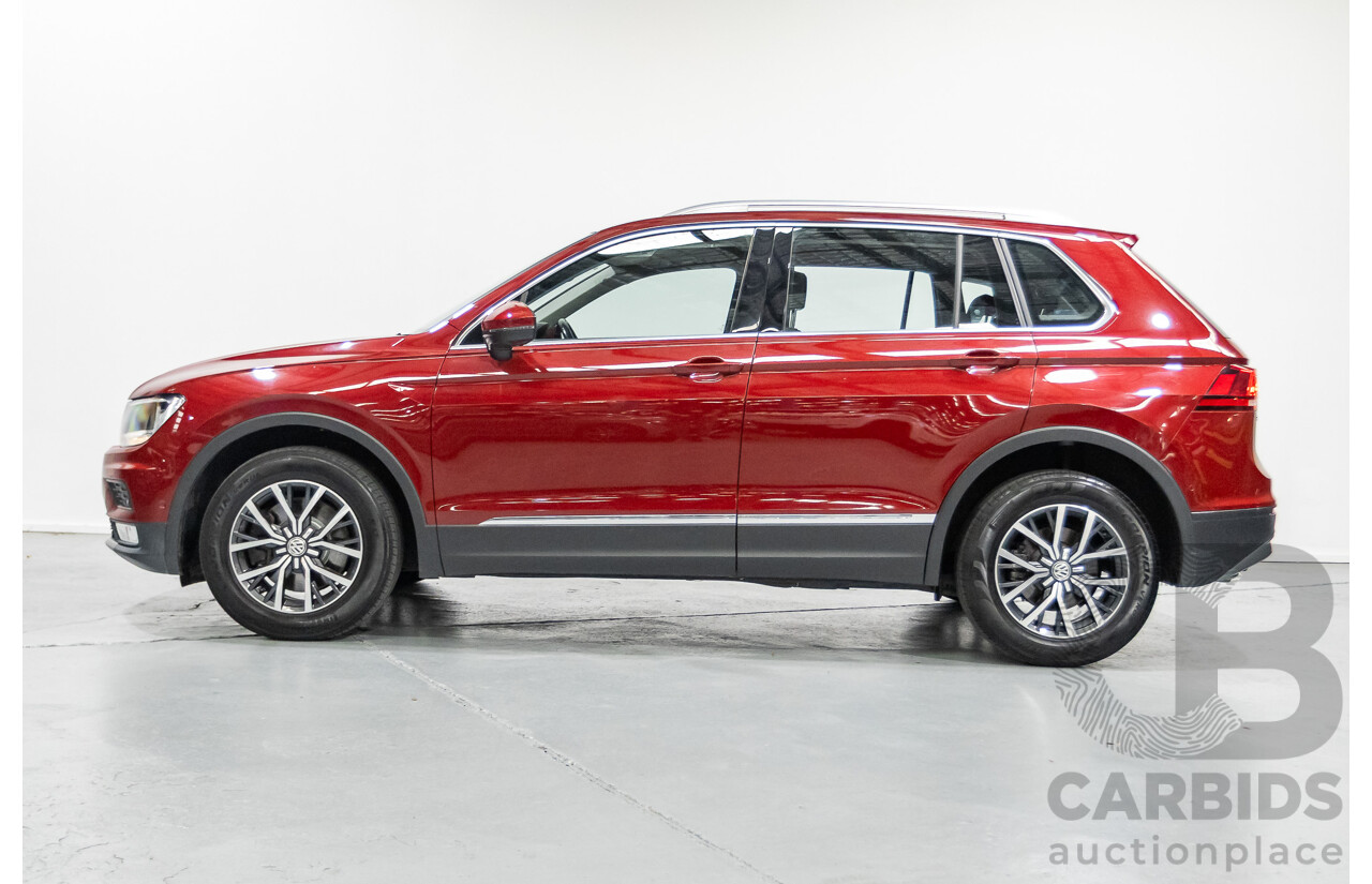11/2016 Volkswagen Tiguan 132 TSI Comfortline (AWD) 5NA 4d Wagon Ruby Red Metallic Turbo 2.0L