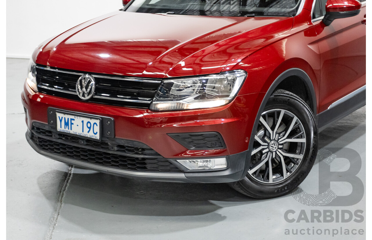 11/2016 Volkswagen Tiguan 132 TSI Comfortline (AWD) 5NA 4d Wagon Ruby Red Metallic Turbo 2.0L