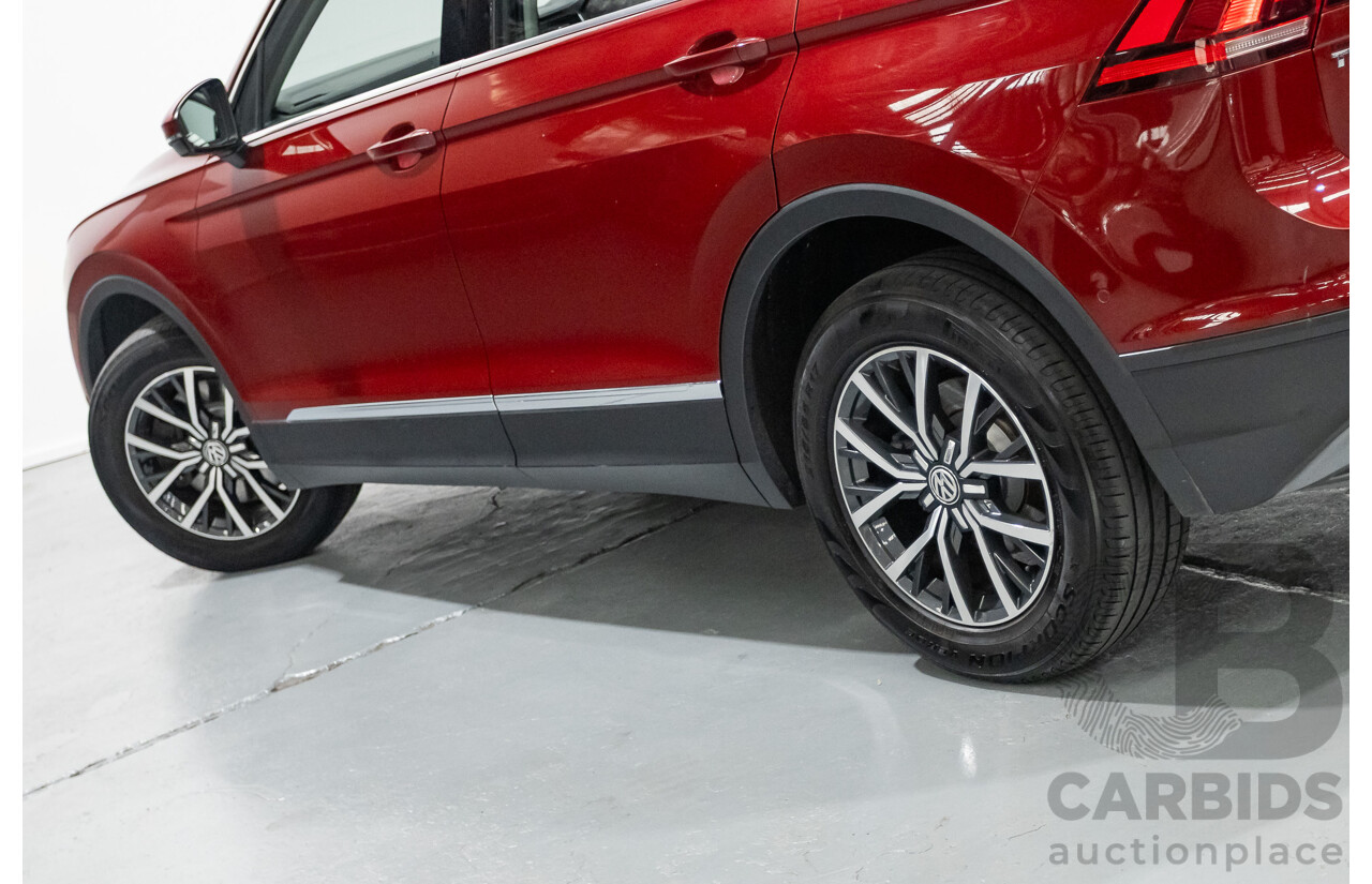 11/2016 Volkswagen Tiguan 132 TSI Comfortline (AWD) 5NA 4d Wagon Ruby Red Metallic Turbo 2.0L