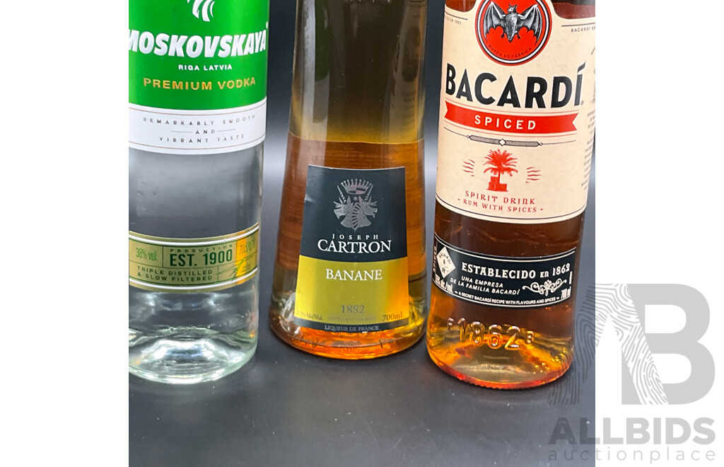 BACARDI Siced Rum 700ml, JOSEPH CARTRON Banane Liqueur 700ml and MOSKOVSKAYA Vodka 700ml - Lot of 3