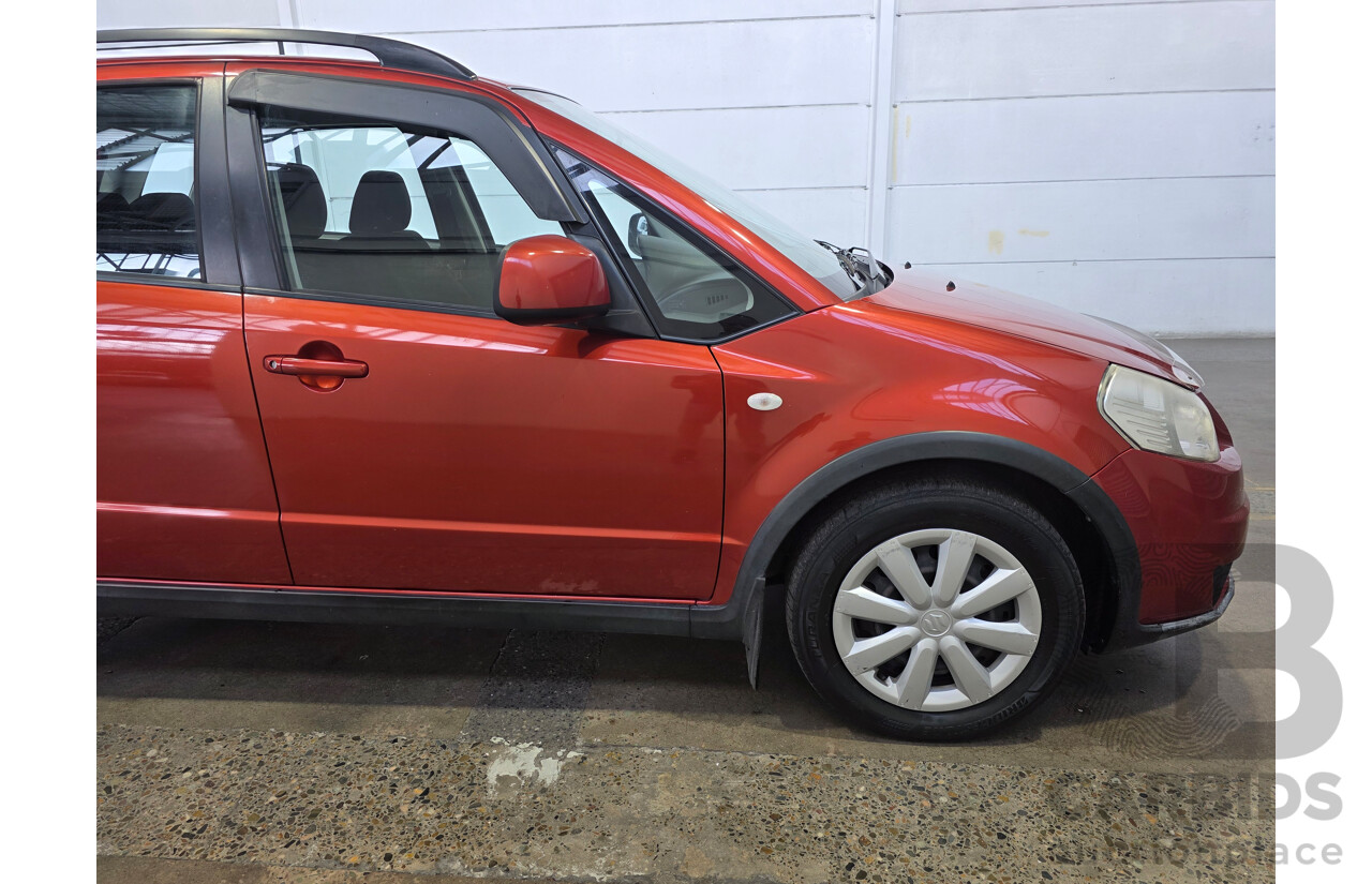 7/2012 Suzuki SX4 (AWD) GY MY11 5d Hatchback Red 2.0L