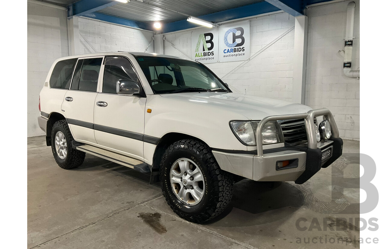 05/2004 Toyota Landcruiser GXL (4x4) UZJ100R 4d Wagon Arctic white V8 4.7L 8 Seater