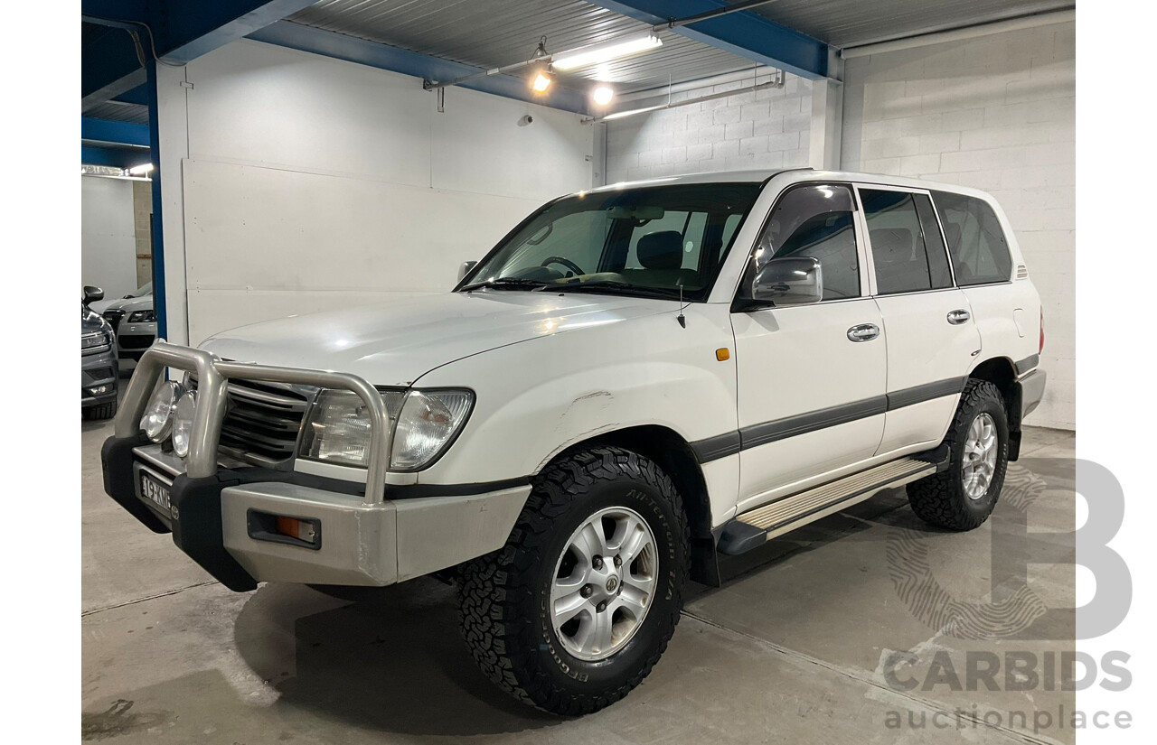 05/2004 Toyota Landcruiser GXL (4x4) UZJ100R 4d Wagon Arctic white V8 4.7L 8 Seater