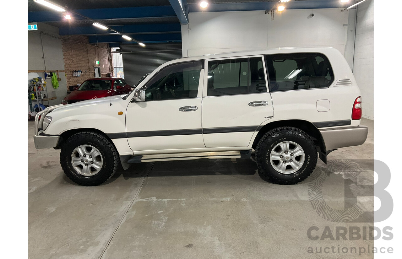 05/2004 Toyota Landcruiser GXL (4x4) UZJ100R 4d Wagon Arctic white V8 4.7L 8 Seater