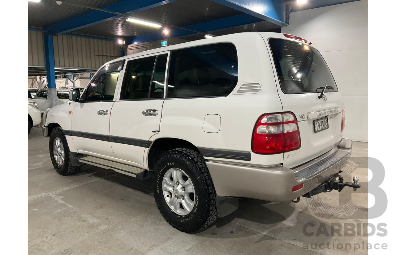 05/2004 Toyota Landcruiser GXL (4x4) UZJ100R 4d Wagon Arctic white V8 4.7L 8 Seater