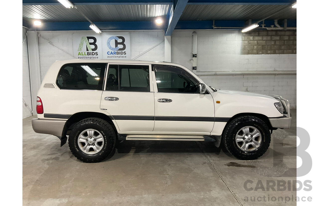 05/2004 Toyota Landcruiser GXL (4x4) UZJ100R 4d Wagon Arctic white V8 4.7L 8 Seater