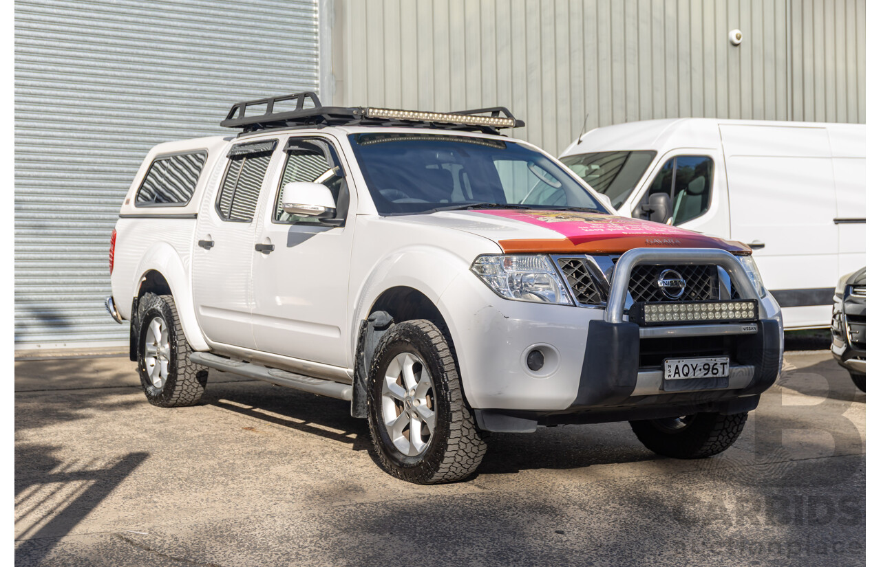 9/2013 Nissan Navara ST (4x4) D40 MY12 Dual Cab P/Up White 2.5L