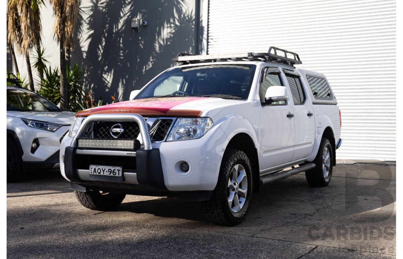 9/2013 Nissan Navara ST (4x4) D40 MY12 Dual Cab P/Up White 2.5L