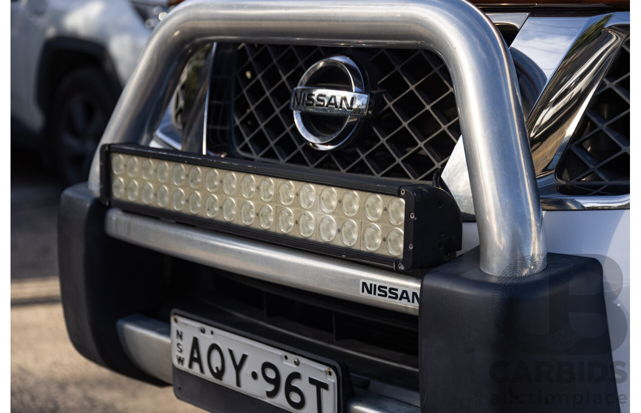 9/2013 Nissan Navara ST (4x4) D40 MY12 Dual Cab P/Up White 2.5L