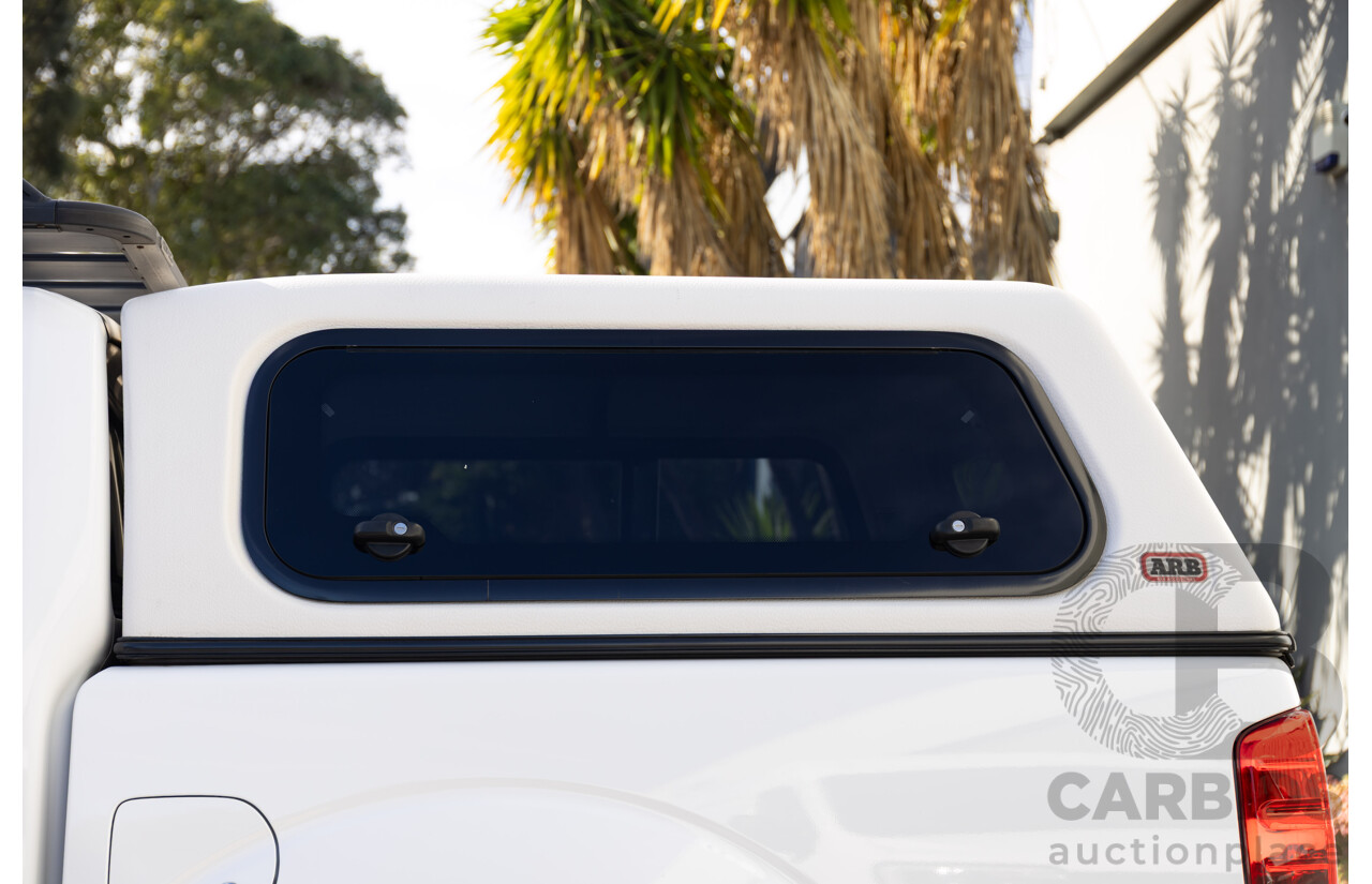 9/2013 Nissan Navara ST (4x4) D40 MY12 Dual Cab P/Up White 2.5L