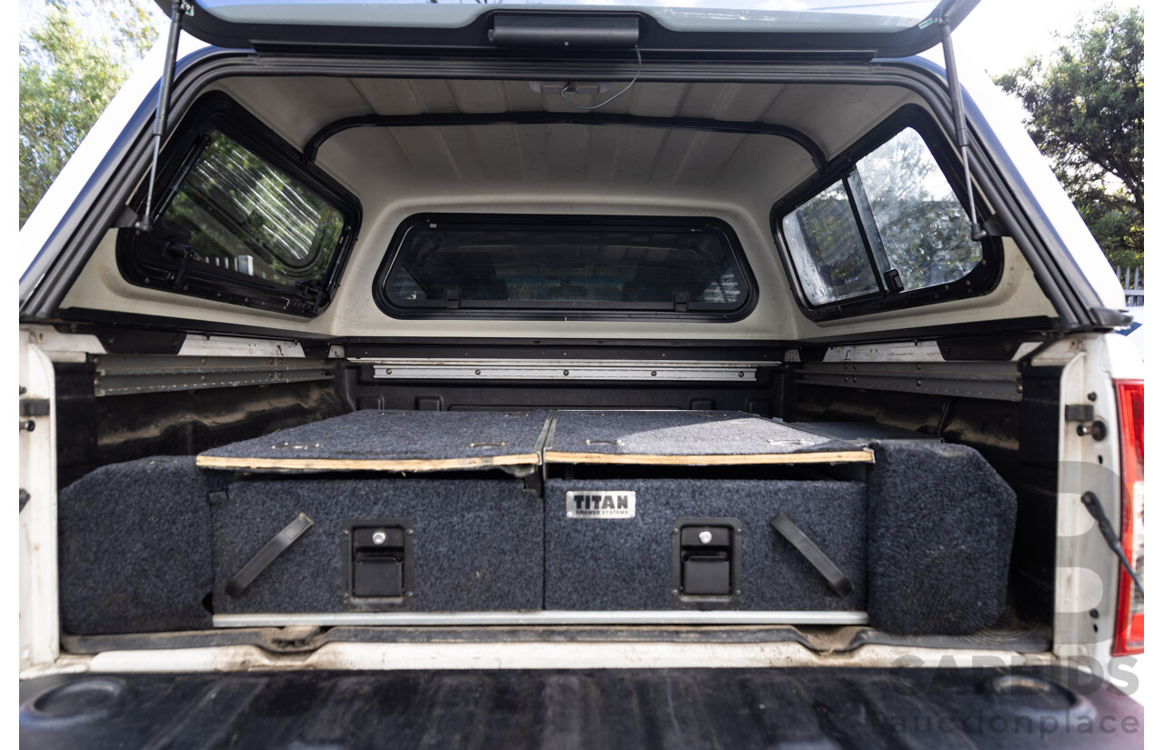 9/2013 Nissan Navara ST (4x4) D40 MY12 Dual Cab P/Up White 2.5L