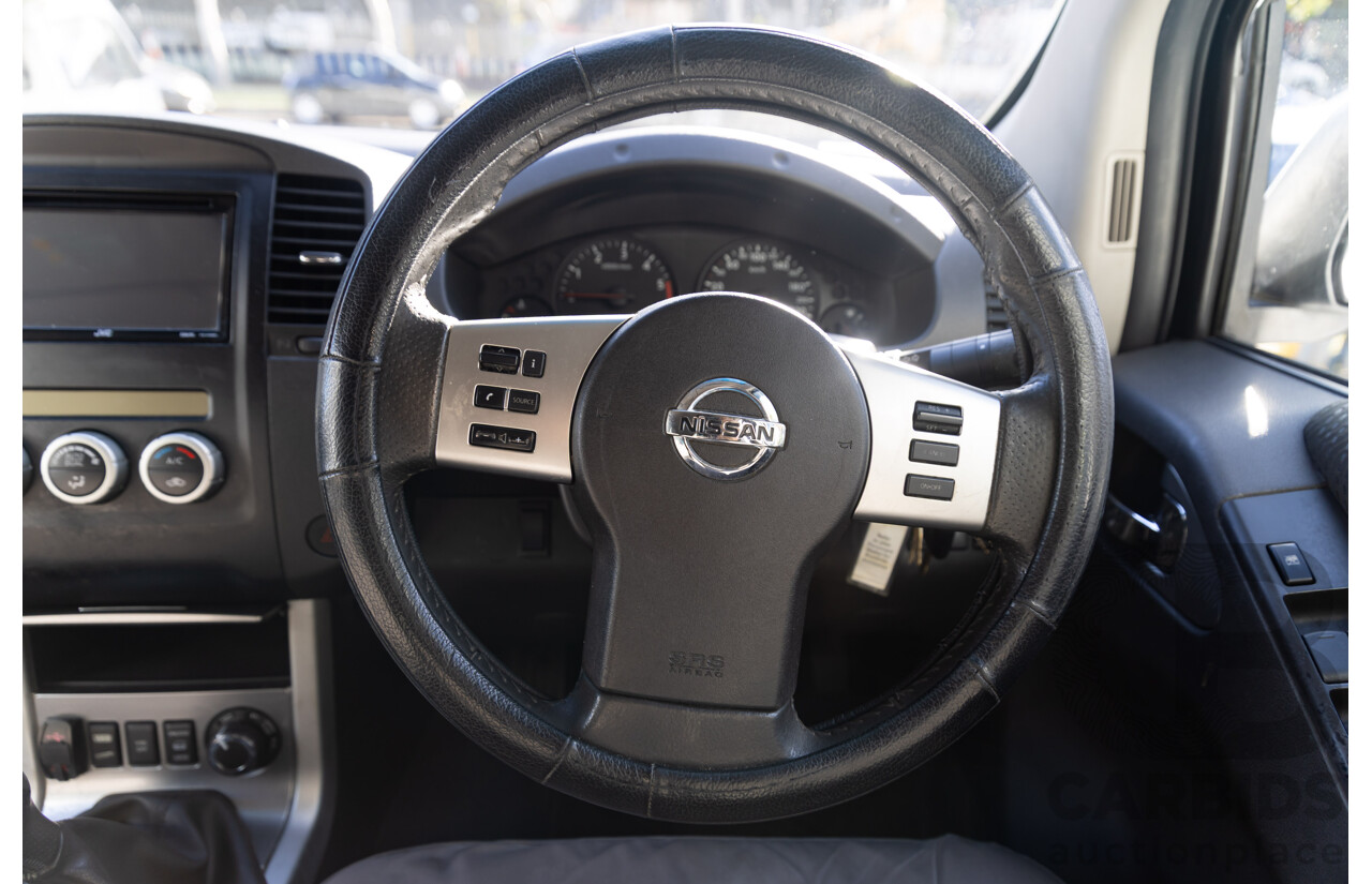 9/2013 Nissan Navara ST (4x4) D40 MY12 Dual Cab P/Up White 2.5L