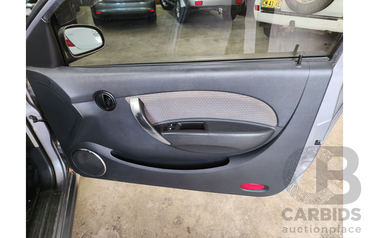 6/2009 Holden Barina  TK MY09 3d Hatchback Grey 1.6L