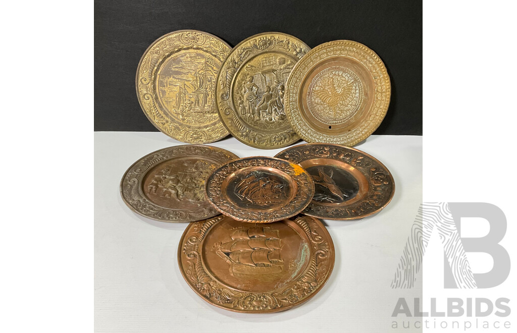 Collection of Seven Large Copper and Brass Decorative Wall Plates