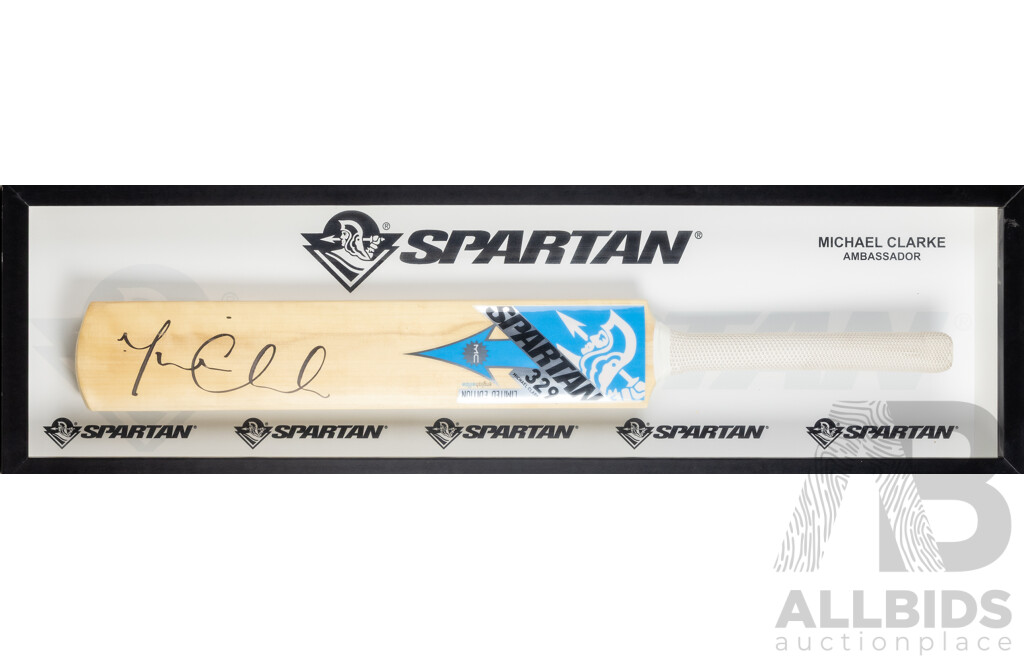 Framed Signed Spartan Cricket Bat by Michael Clarke