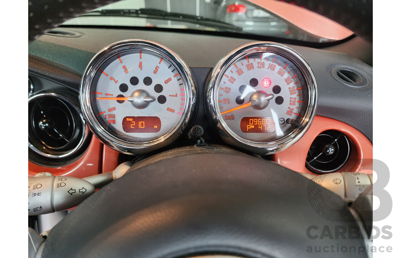 06/2006 Mini Cooper S Cabrio R52 2d Cabriolet Orange 1.6L