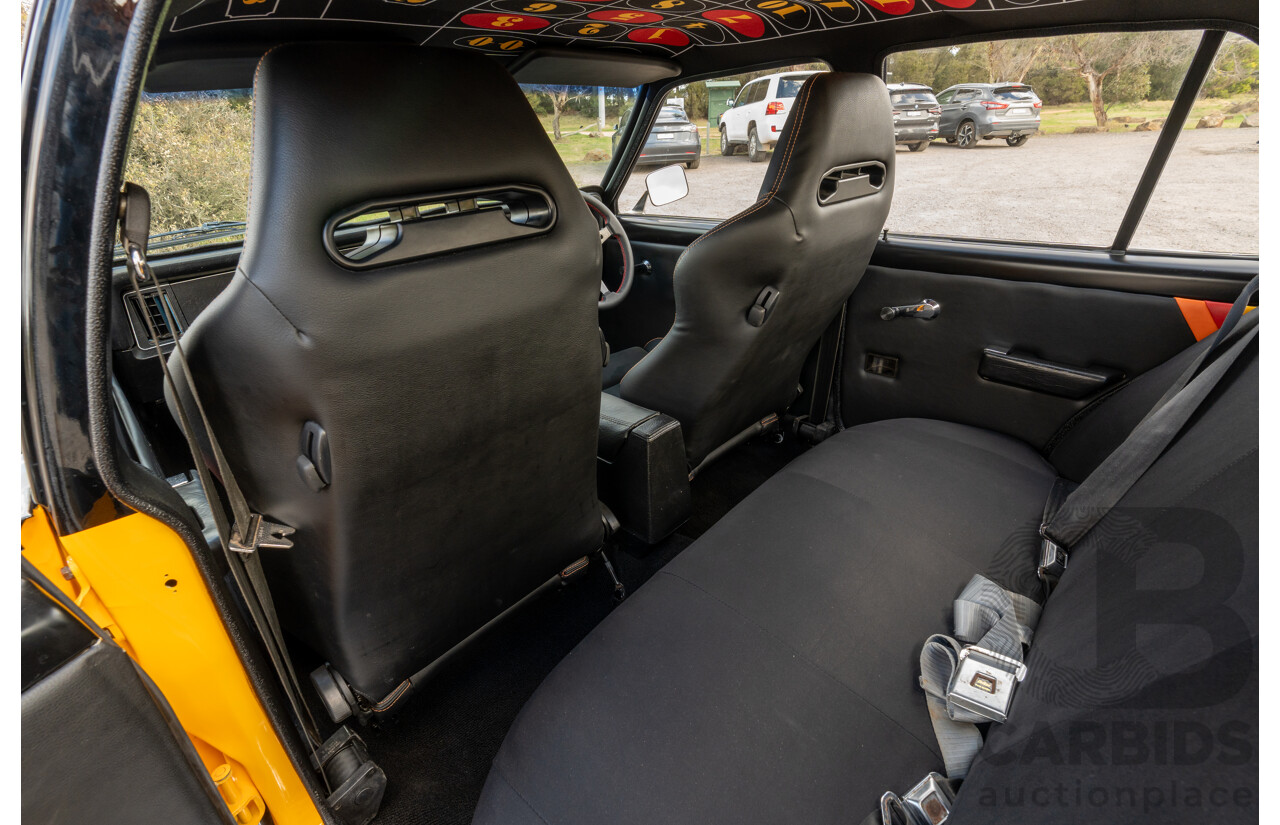 04/1974 Holden LH Torana SL/R 5000 Tribute 4d Sedan Chrome Yellow / Black V8 5.0L - Modified