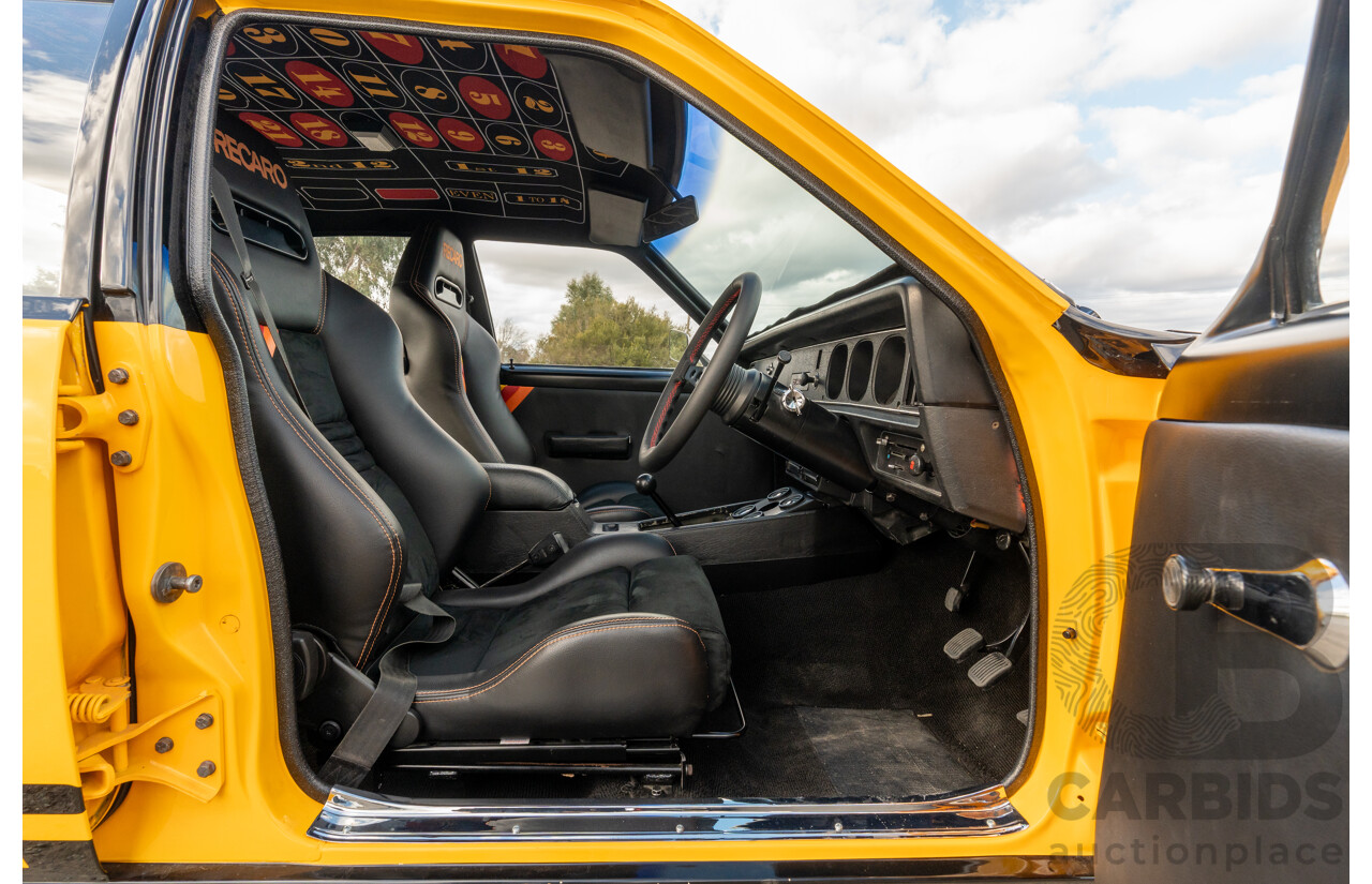 04/1974 Holden LH Torana SL/R 5000 Tribute 4d Sedan Chrome Yellow / Black V8 5.0L - Modified