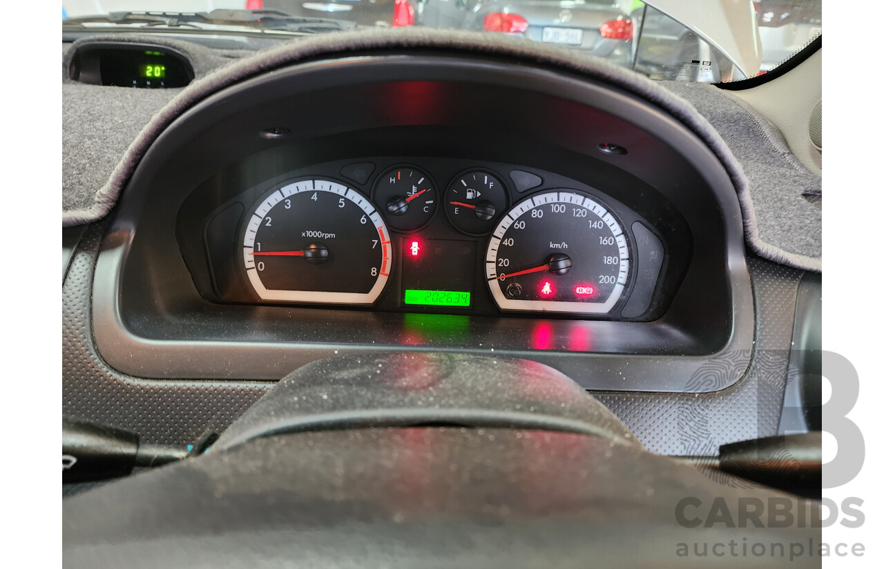 06/2009 Holden Barina  TK MY09 3d Hatchback Grey 1.6L