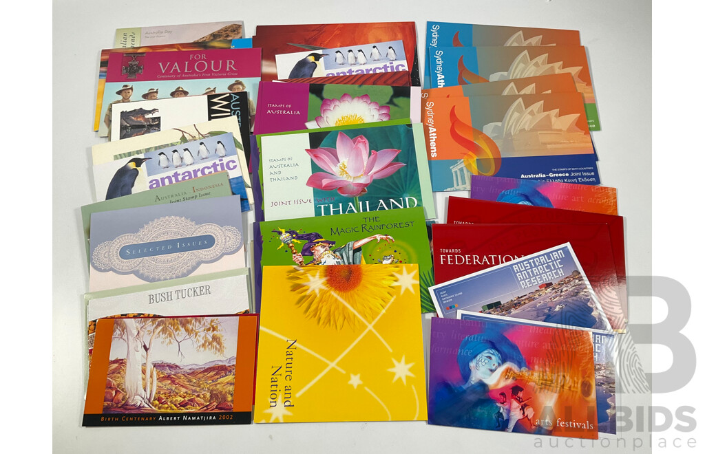 Collection of Australian Mint Stamp Packs, Mostly 2000-2002 Including Motor Racing, Thailand Joint Issues, Magic Rain Forest, Sydney/Athens, Arts Festivals, for Valour, Antarctic Penguins and More    - Face Value Approximately $130