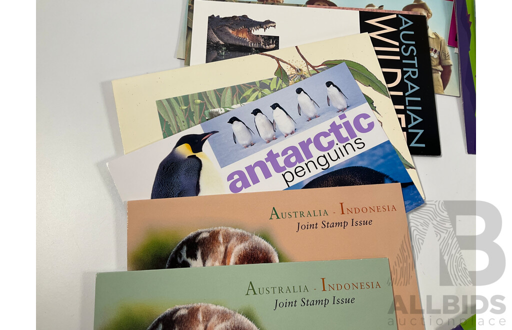 Collection of Australian Mint Stamp Packs, Mostly 2000-2002 Including Motor Racing, Thailand Joint Issues, Magic Rain Forest, Sydney/Athens, Arts Festivals, for Valour, Antarctic Penguins and More    - Face Value Approximately $130