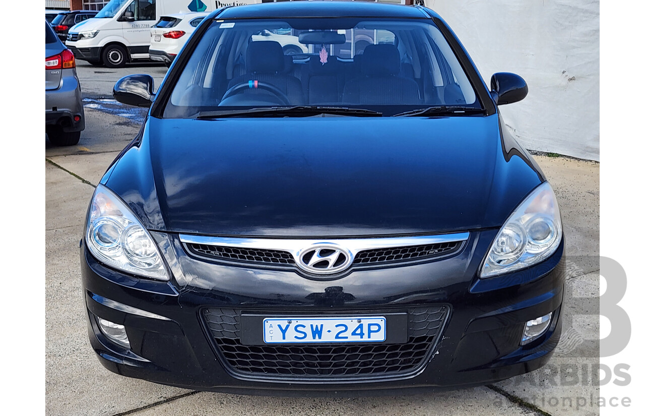 04/2010 Hyundai i30 SLX FD MY10 5d Hatchback Black 2.0L