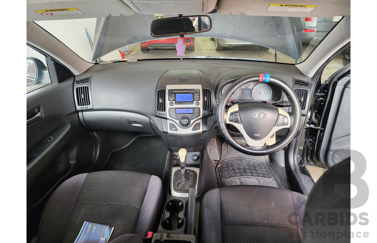 04/2010 Hyundai i30 SLX FD MY10 5d Hatchback Black 2.0L