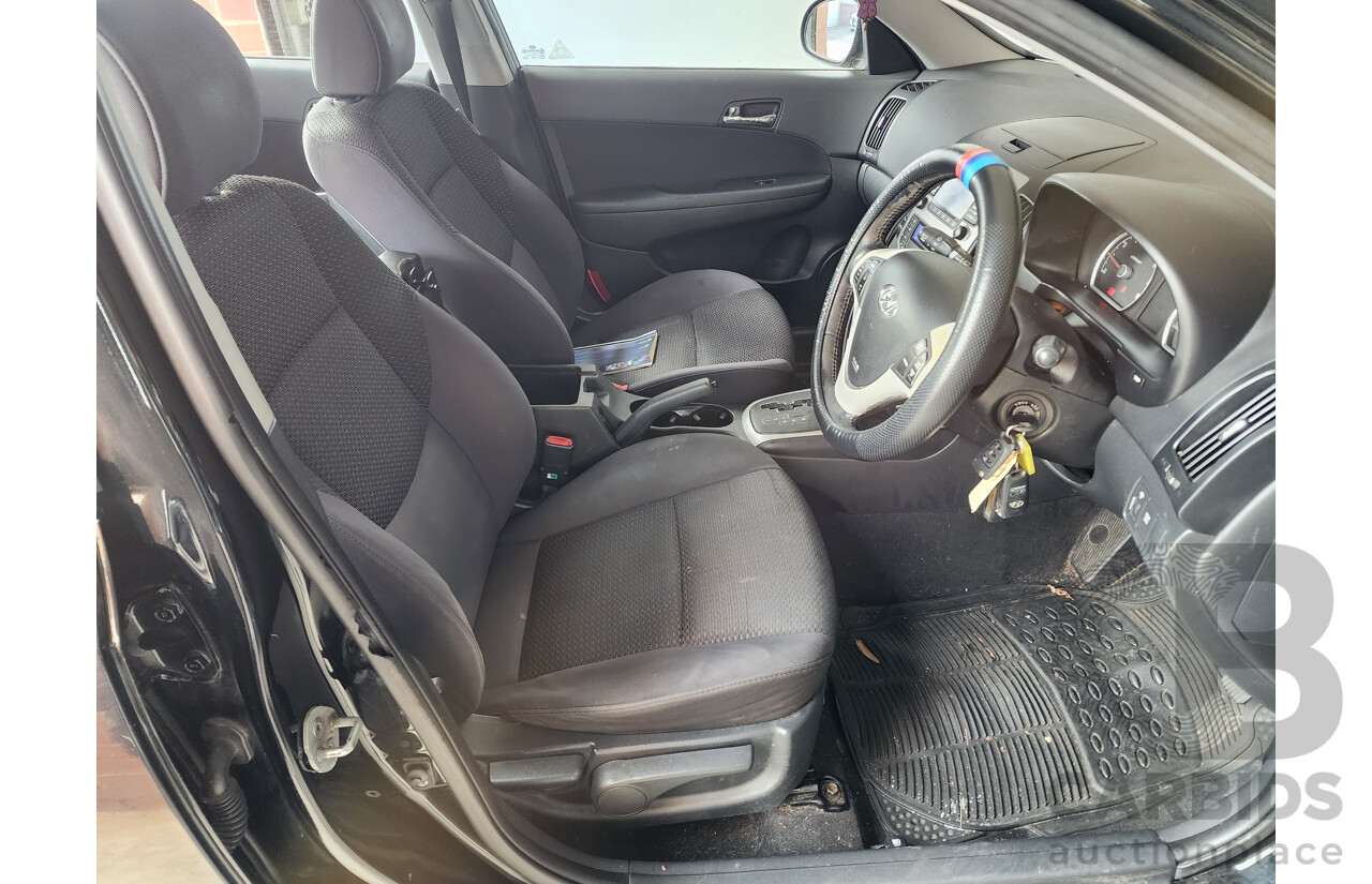 04/2010 Hyundai i30 SLX FD MY10 5d Hatchback Black 2.0L