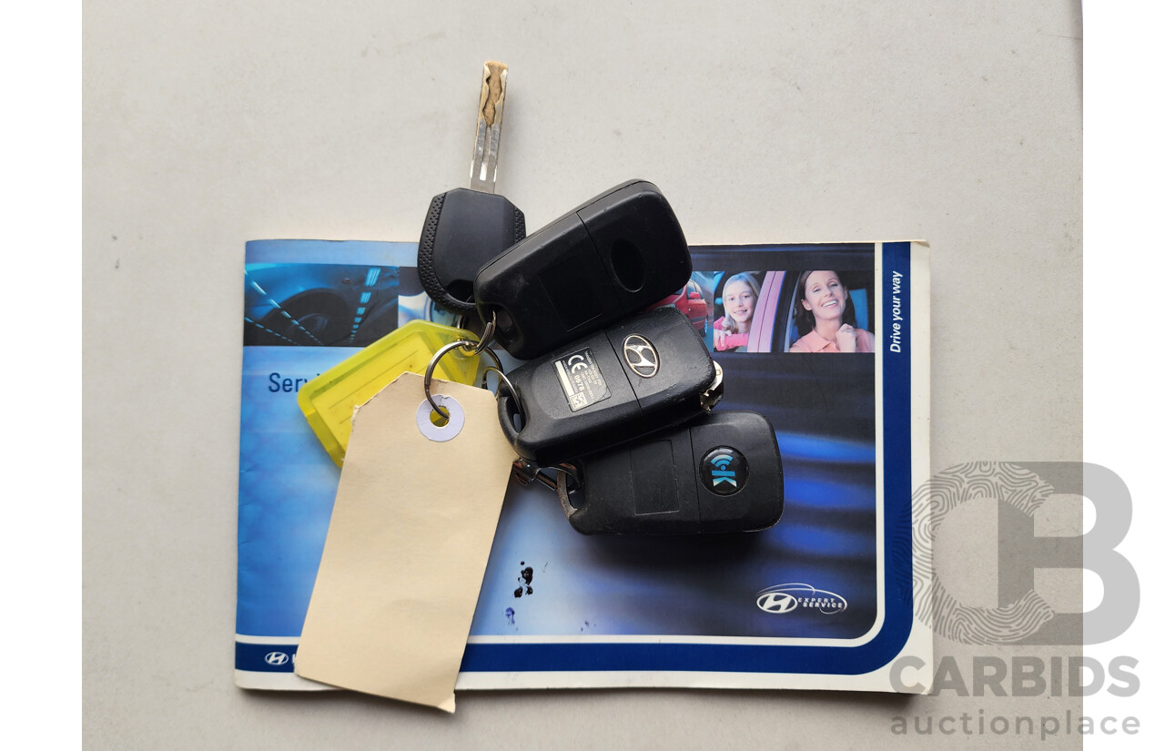 04/2010 Hyundai i30 SLX FD MY10 5d Hatchback Black 2.0L