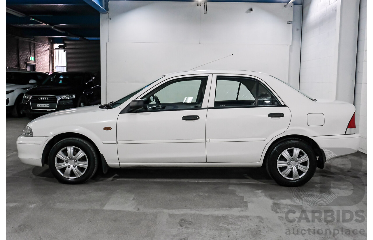 11/2000 Ford Laser GLXi KN 4d Sedan White 1.8L