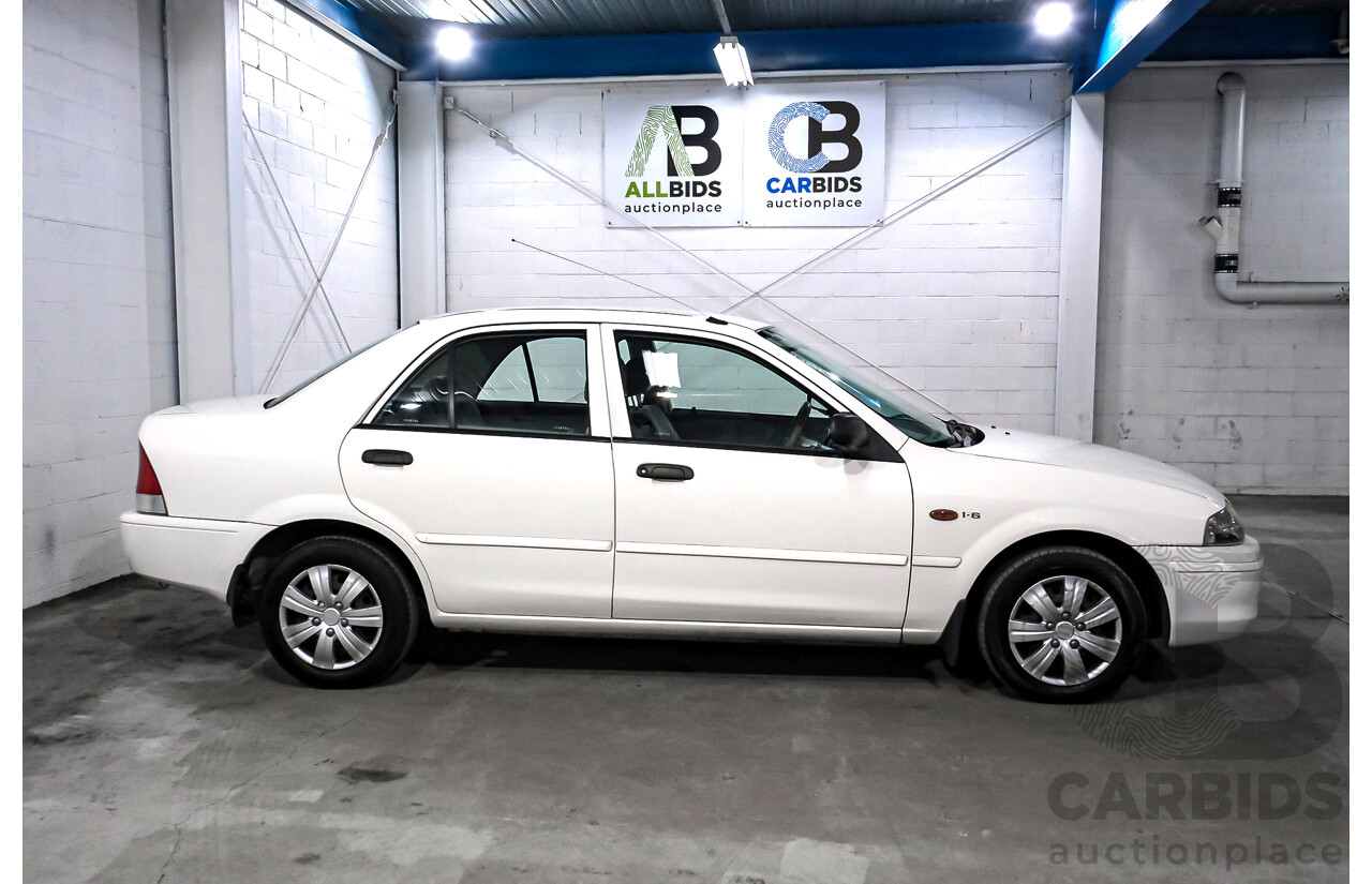 11/2000 Ford Laser GLXi KN 4d Sedan White 1.8L