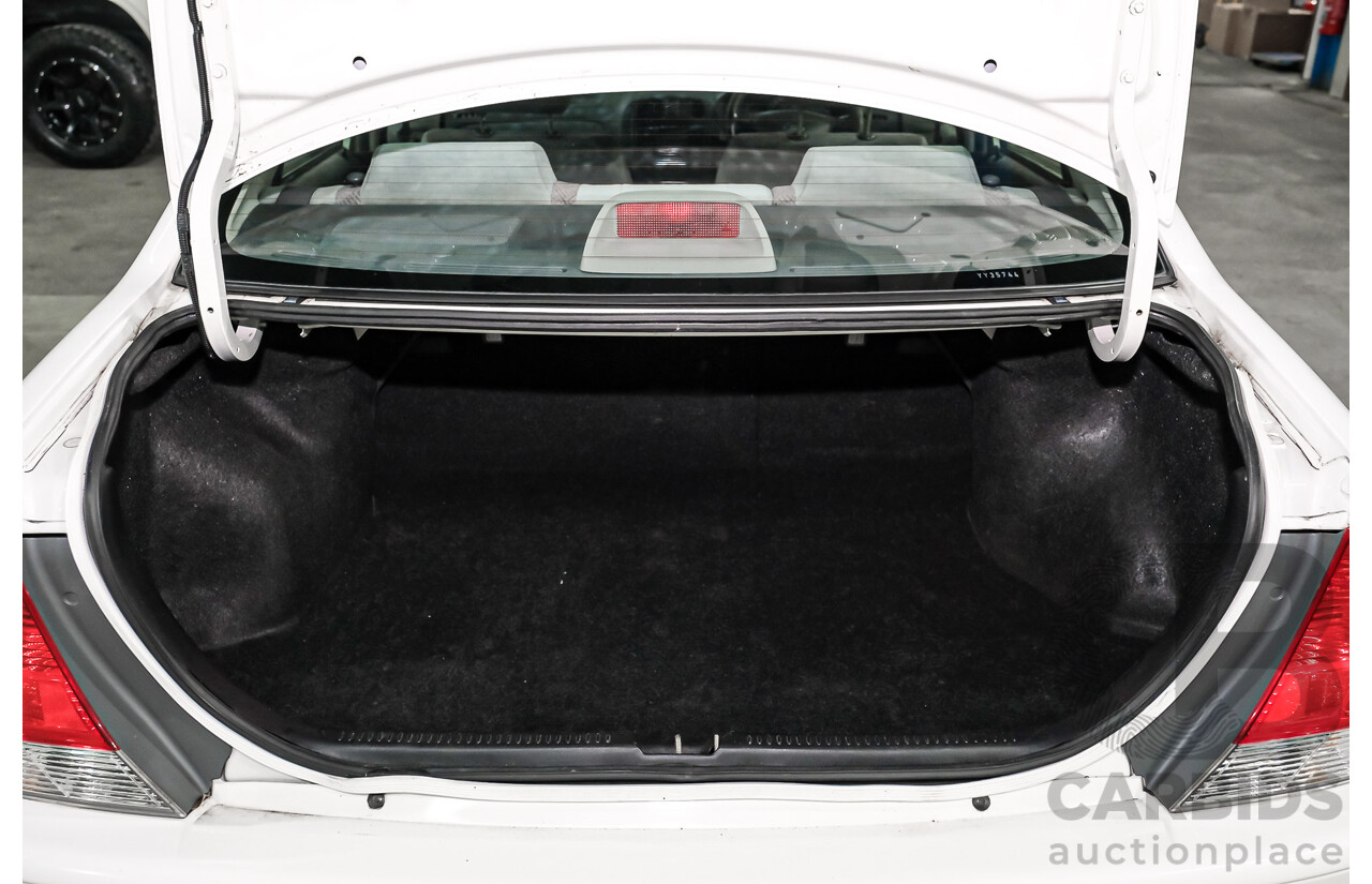 11/2000 Ford Laser GLXi KN 4d Sedan White 1.8L