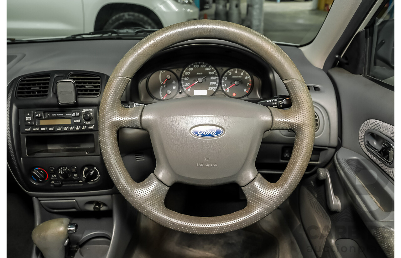 11/2000 Ford Laser GLXi KN 4d Sedan White 1.8L