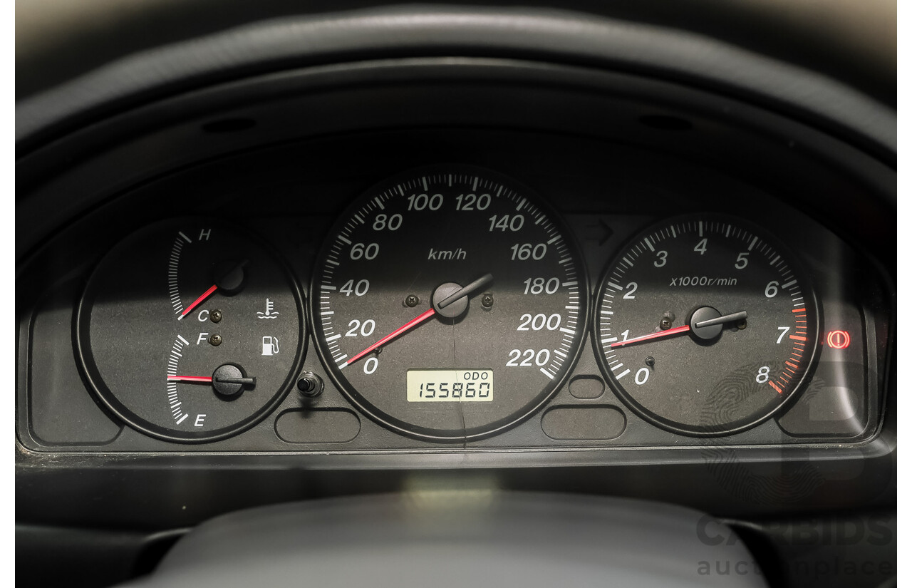 11/2000 Ford Laser GLXi KN 4d Sedan White 1.8L
