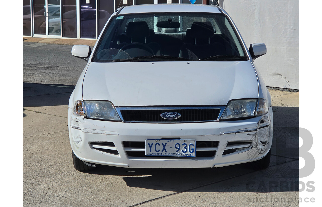 06/2001 Ford Laser GLXi KN 4d Sedan White1.8L