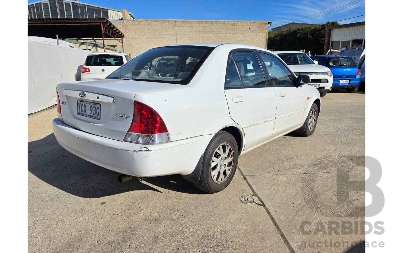 06/2001 Ford Laser GLXi KN 4d Sedan White1.8L